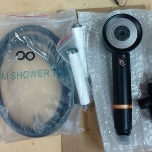 Matte Black Handheld Shower Head with Hose and Brushed Gold Accent